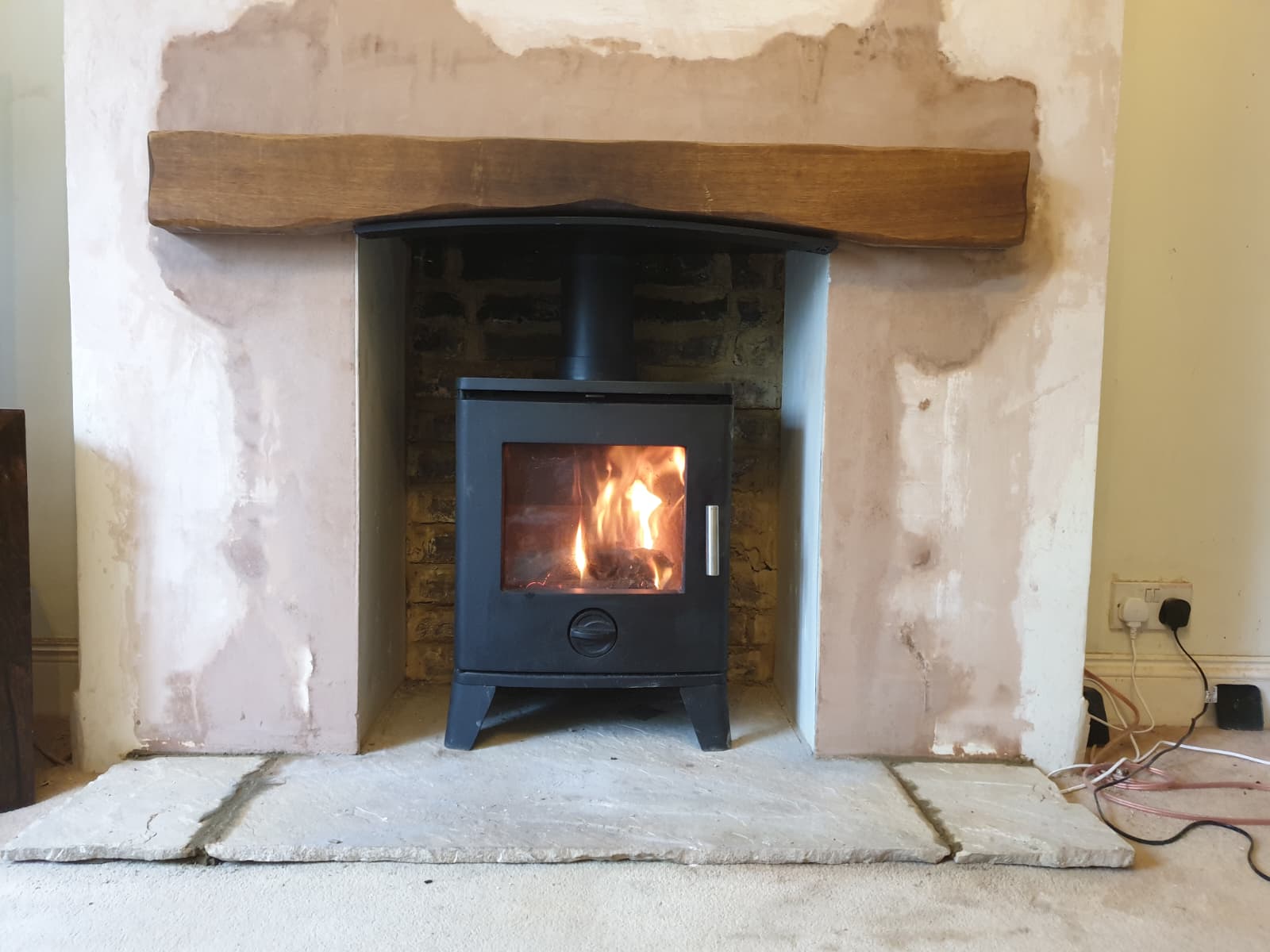 Wood burning stove and fireplace installation by Windsor & Eton Stoves