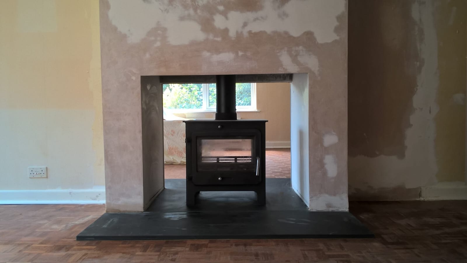Wood burning stove and fireplace installation by Windsor & Eton Stoves