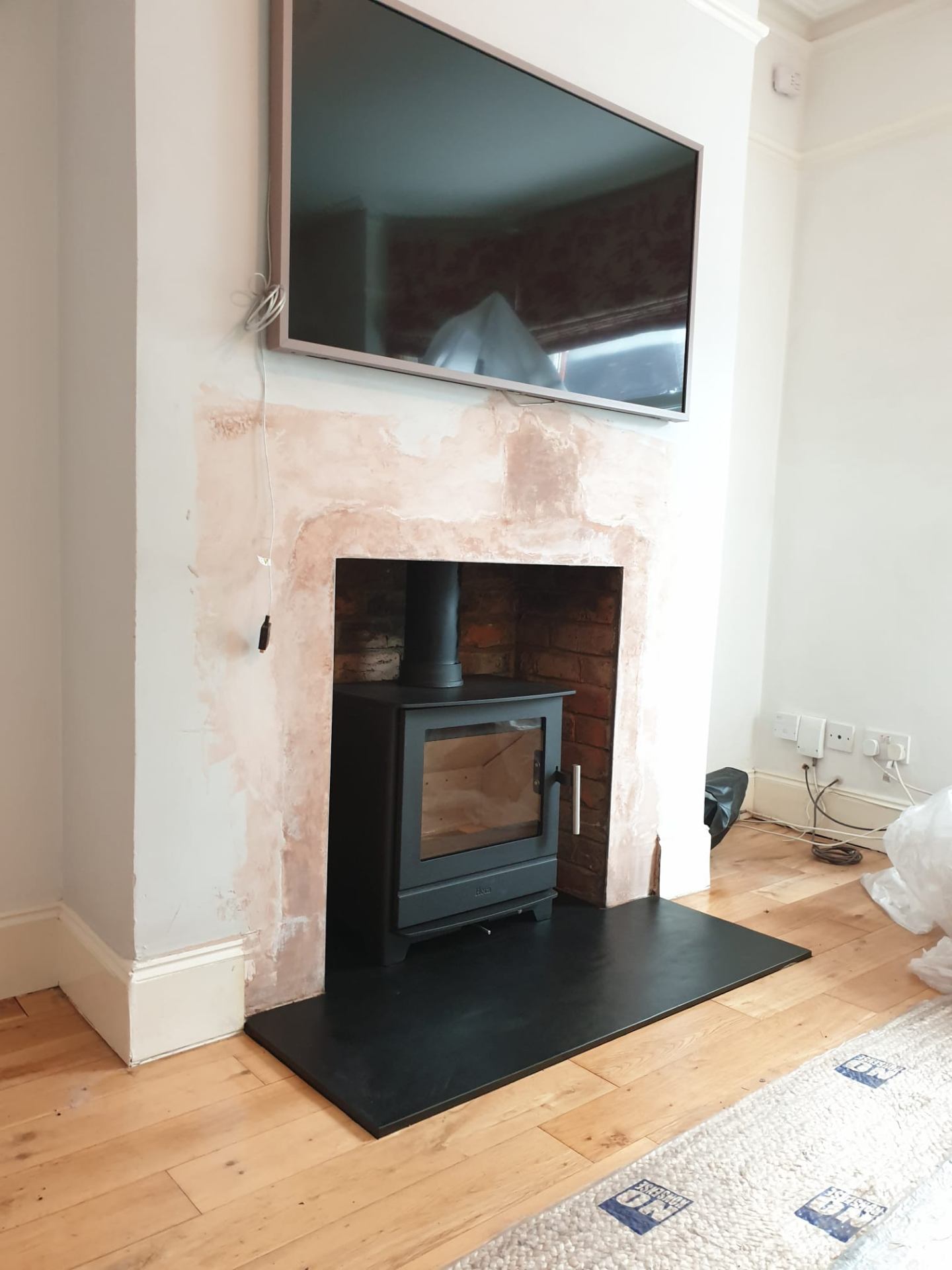 Wood burning stove and fireplace installation by Windsor & Eton Stoves