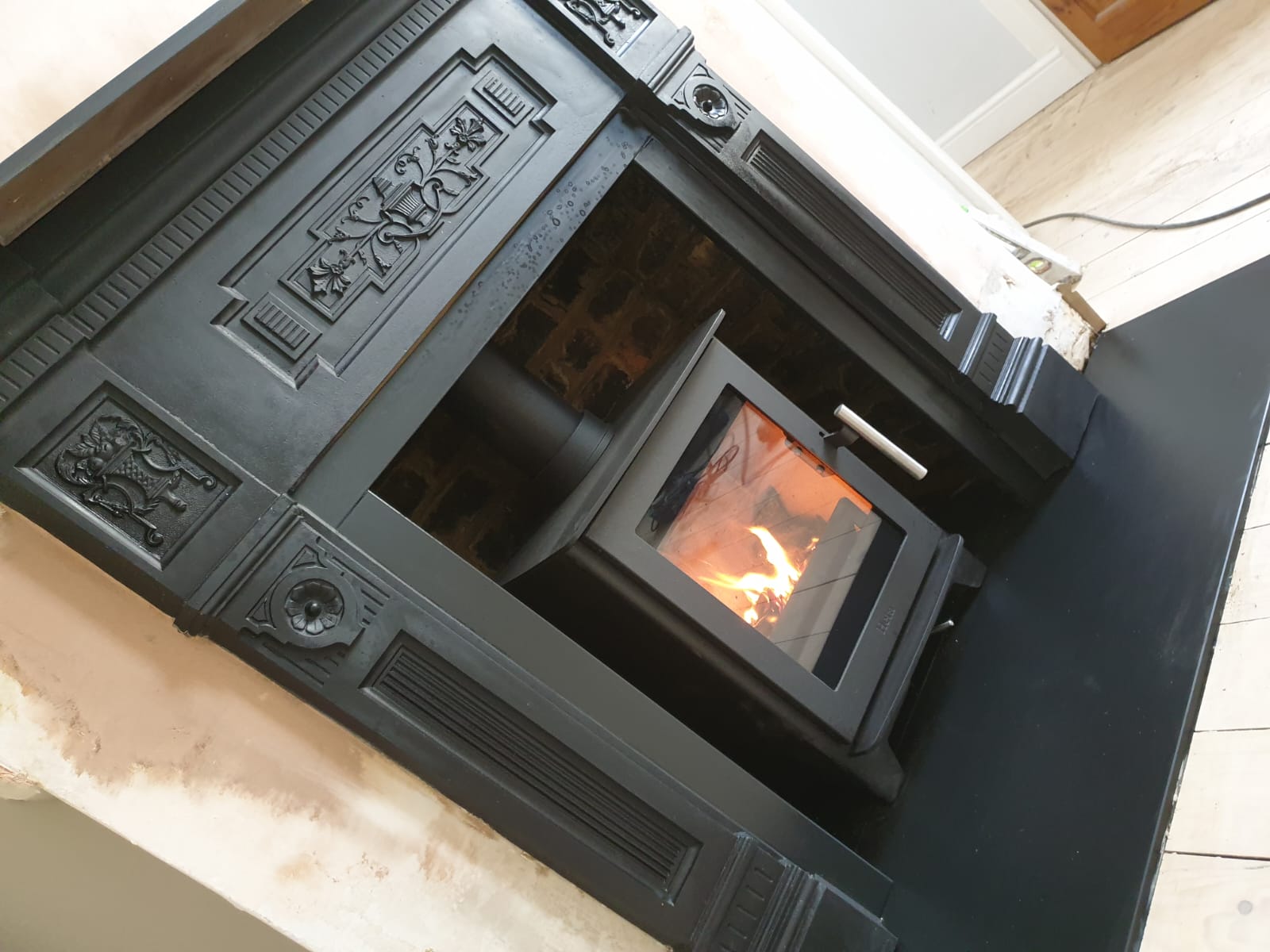 Wood burning stove and fireplace installation by Windsor & Eton Stoves